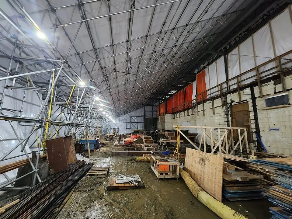 A warehouse with many construction materials in it.